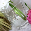 Earsense Silver swirl drop earrings with diamante